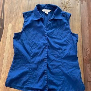Petite Sophisticated Sleeveless Button Down Top.